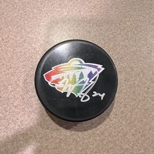 Autographed Matt Dumba Pride Night Puck Minnesota Wild